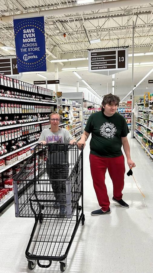 Two members grocery shopping together